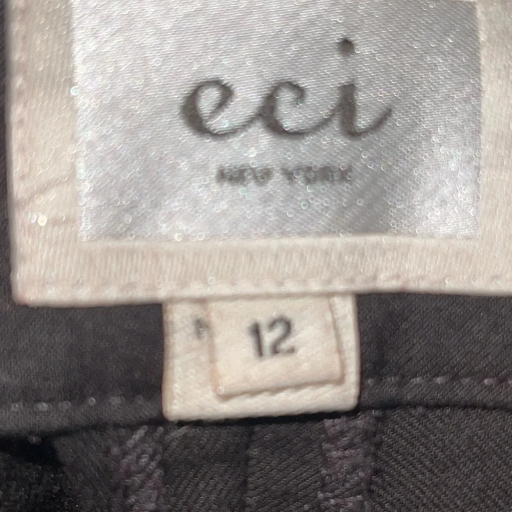 ECI Bermuda shorts with cuffed hem. Size 12 GUC
Color is brown. - Picture 7 of 9